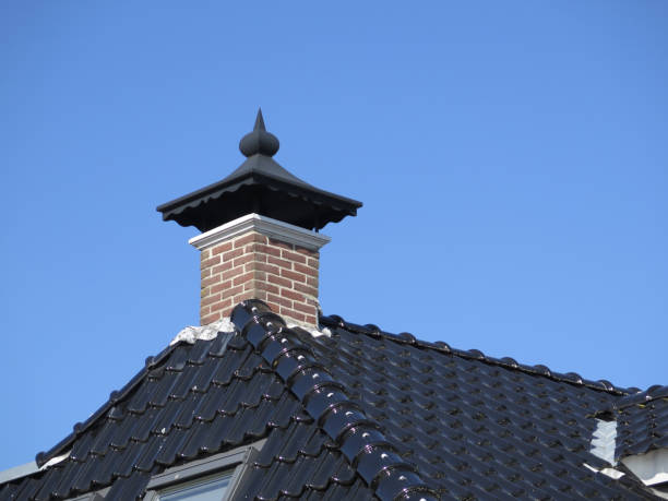 istock Chimney cover and Glazed roof tiles 963384114