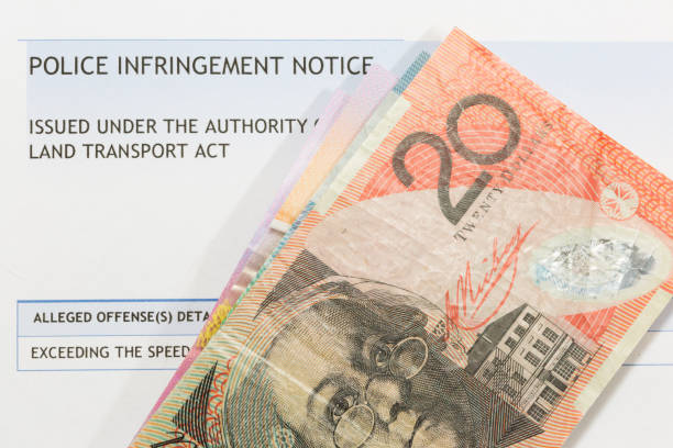 istock A traffic fine and Australian money. 963384224