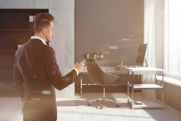 istock Company manager office interior, man smartphone 963399226