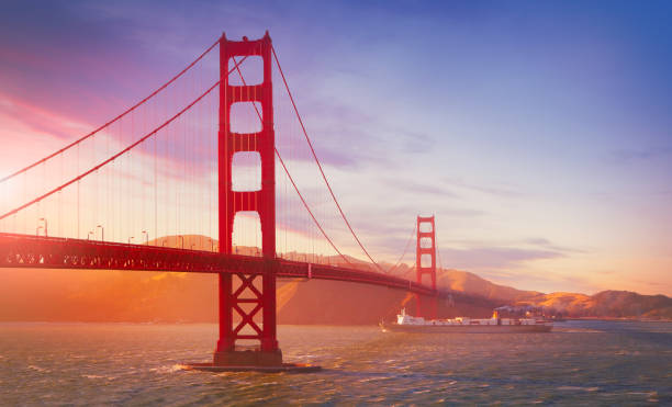 istock Freight cargo ship cruising under the Golden Gate Bridge 963403110