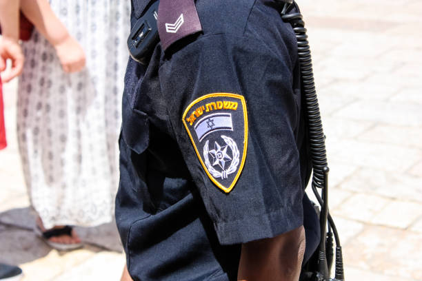 Jerusalem Israel May 21, 2018 View of unknown Israeli police officer walking on the Western wall plaza in the old city of Jerusalem