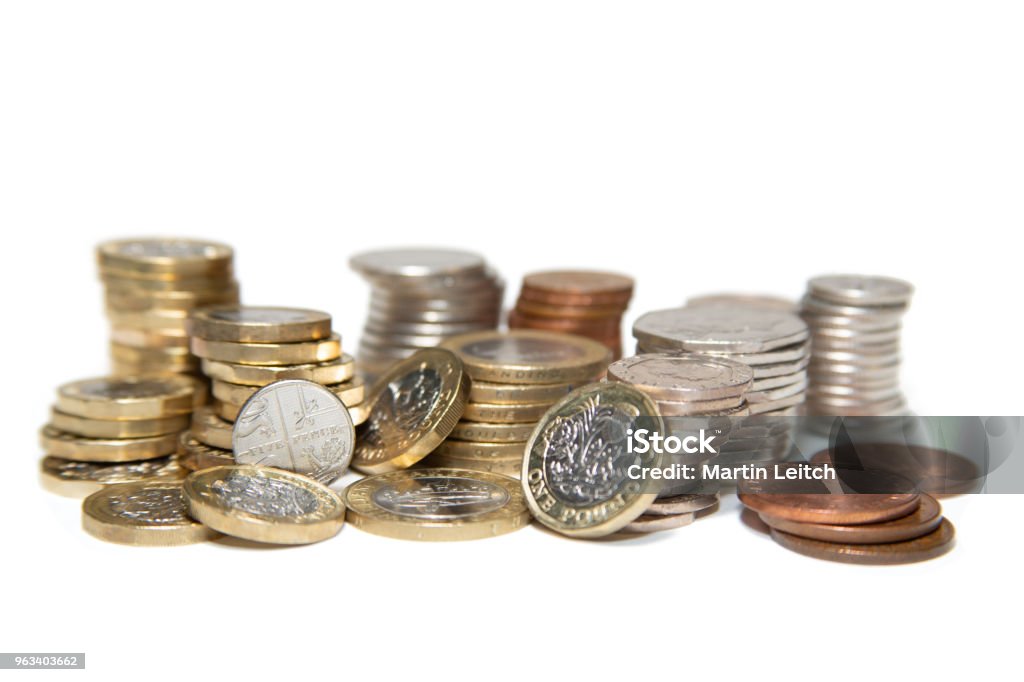 Coins of the United Kingdom Reading/United Kingdom - May 18, 2018: United Kingdom currency in coins. Various, including pound, 50p, 20p, 10p, 5p, 2p, and one pence. Currency Stock Photo