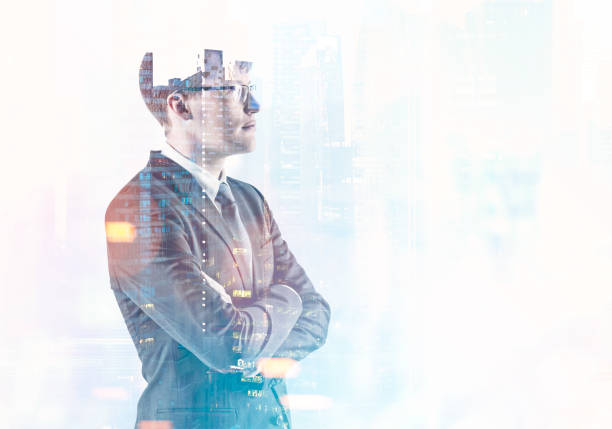istock Serious young businessman, modern city 963403760