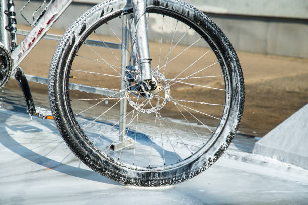 istock mtb bicycle in soap. self-service. bicycle washing 963403868