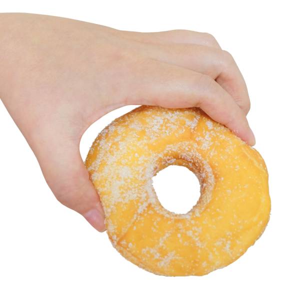 istock Hand Holding Delicious Glazed Donut with Sugar 963407762