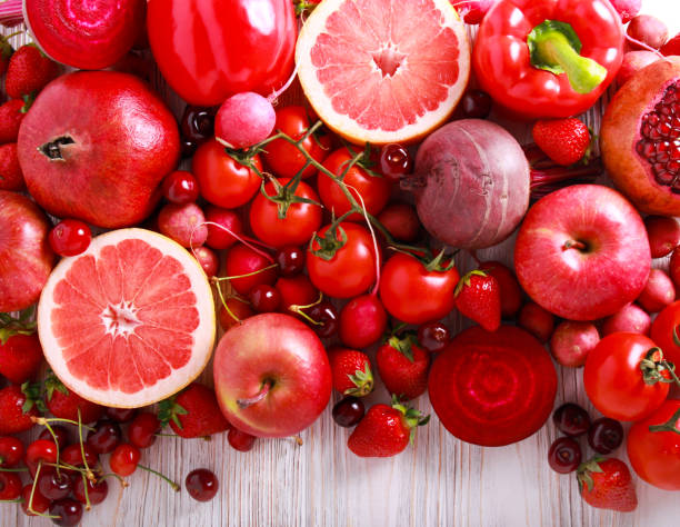 istock Red color assorted vegetables and fruits 963412540