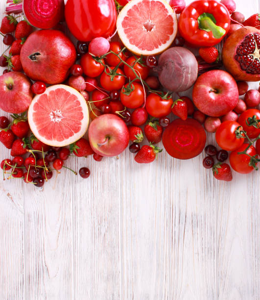 istock Red color assorted vegetables and fruits 963412742