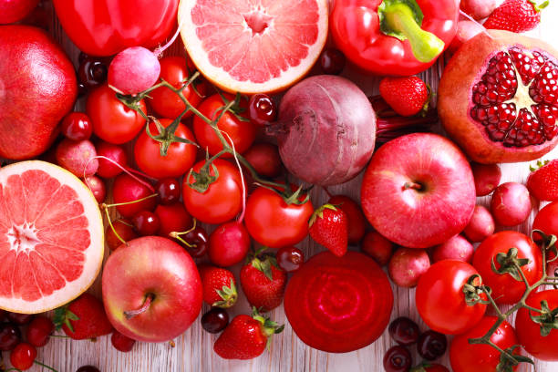 istock Red color assorted vegetables and fruits 963413212