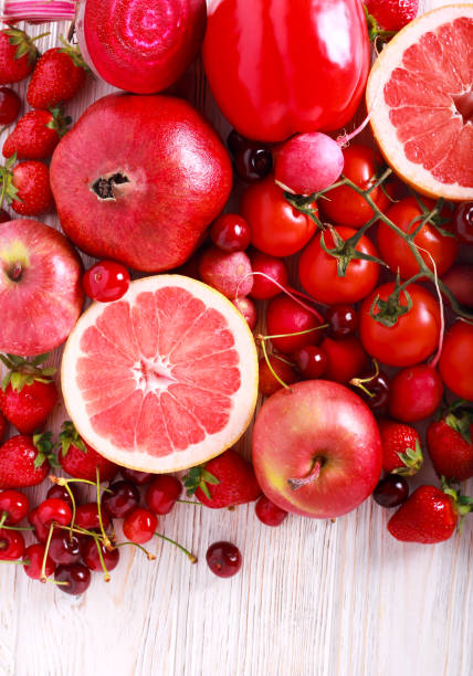 istock Red color assorted vegetables and fruits 963416312