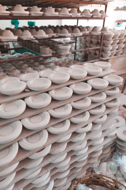 istock Ceramic plates and cups before application of gloss and paint. Vietnam 963417442