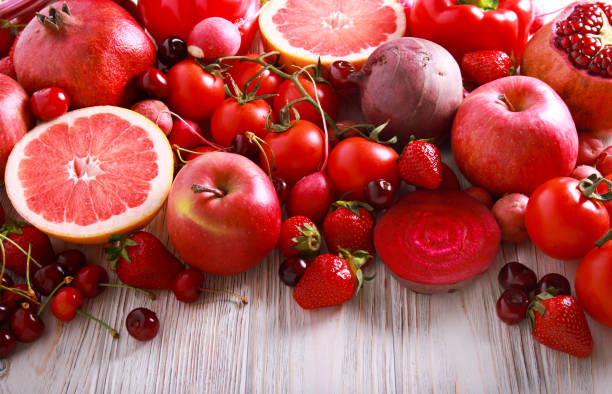 istock Red color assorted vegetables and fruits 963417774