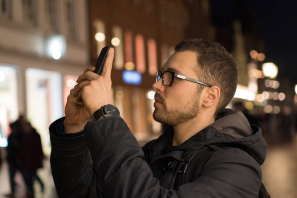 istock Man take photo with cell phone 963423166