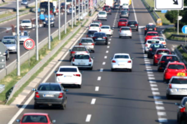 istock Rush hour with defocused cars stuck in and traffic jam 963423916