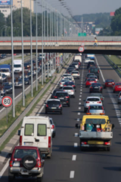 istock Rush hour with defocused cars stuck in and traffic jam 963424134