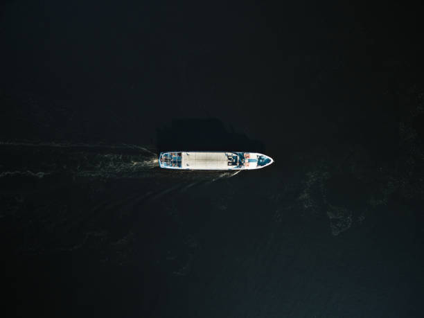 istock aerial view of excursion boat with passengers on river 963424698