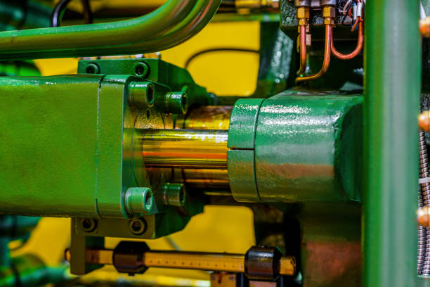 istock Fragment of the injection molding machine 963427666