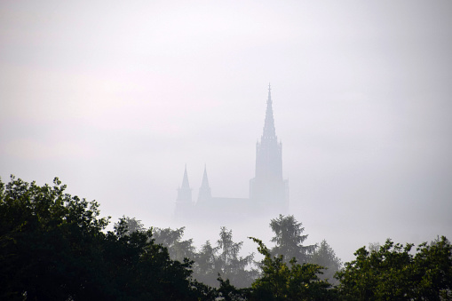 Ulm Minster in the mist in the morning