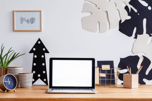 istock Mockup of laptop in office 963433618