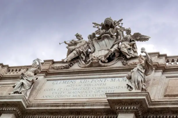 Trevi Fountain : Rome, Italy - Closeup of figures at the top of the fountain