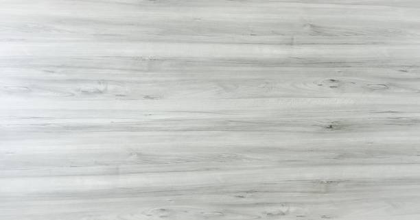 istock wood texture background, light weathered rustic oak. faded wooden varnished paint showing woodgrain texture. hardwood washed planks pattern table top view. 963440086