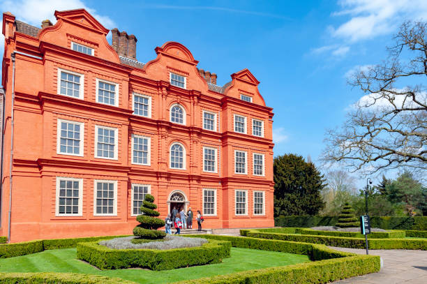 Old classic building of the Dutch House, one of the few surviving parts of the Kew Palace complex, located in Kew Gardens on the banks of the Thames up river from London London, UK - April 2018: Old classic building of the Dutch House, one of the few surviving parts of the Kew Palace complex, located in Kew Gardens on the banks of the Thames up river from London kew gardens stock pictures, royalty-free photos & images