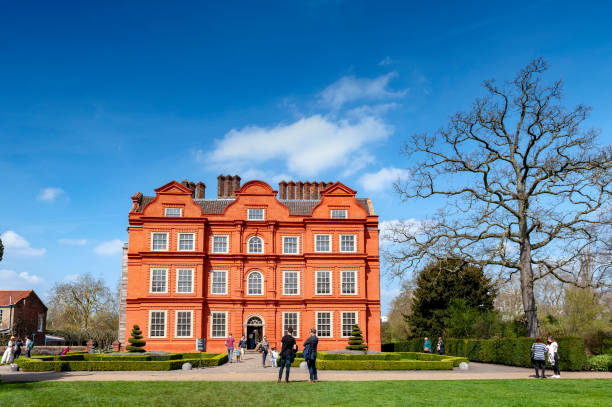 Old classic building of the Dutch House, one of the few surviving parts of the Kew Palace complex, located in Kew Gardens on the banks of the Thames up river from London London, UK - April 2018: Old classic building of the Dutch House, one of the few surviving parts of the Kew Palace complex, located in Kew Gardens on the banks of the Thames up river from London kew gardens spring stock pictures, royalty-free photos & images