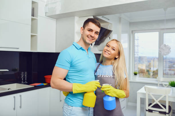 istock A young couple is cleaning an apartment 963447500