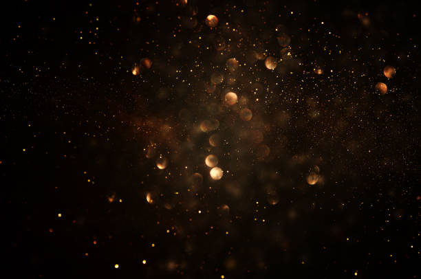 glitter vintage lights background. dark gold and black. de focused. glitter vintage lights background. dark gold and black. de focused glitter stock pictures, royalty-free photos & images