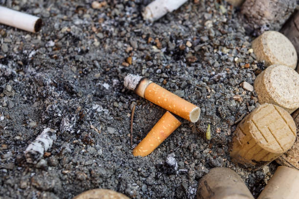 istock Close-up Cigarette butts on the floor, 963454632