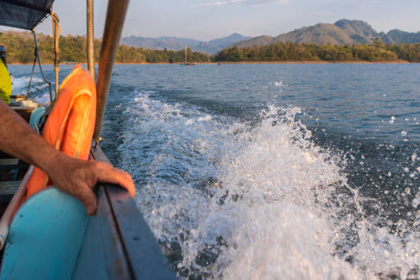 istock Tourist by sailing on river by long tail boat 963455392
