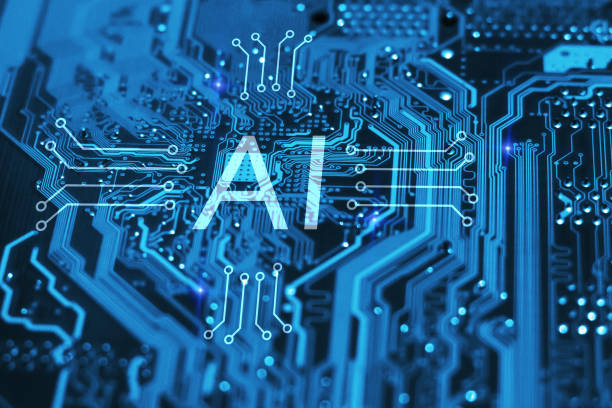 Artificial intelligence and machine learning concept. AI symbol on integrated circuit on blue background. stock photo
