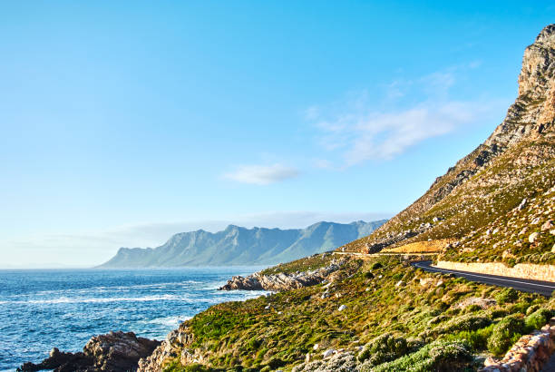 istock Seaside road at sunset Boland Mountain Complex, Western Cape 963477792