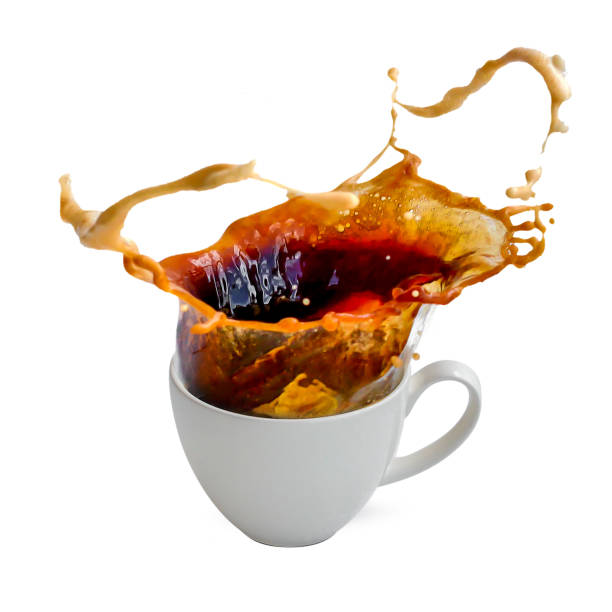 istock Hot coffee splashing isolated on a white background 963507410