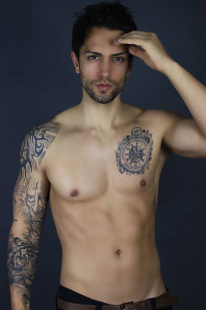 istock Studio portrait of handsome young man 963523602