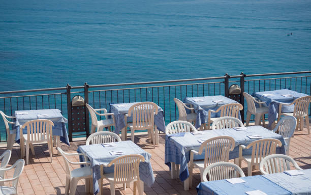 istock Restaurant on a terrace overlooking the sea. 963529872