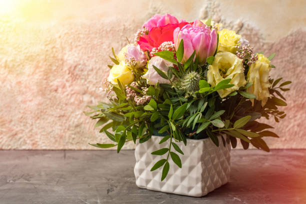 istock Magnificent bouquet of roses in a white vase 963533676