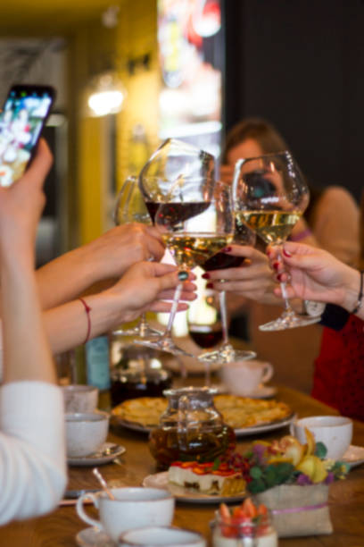 Abstract blur. Glasses of wine on the table in the restaurant