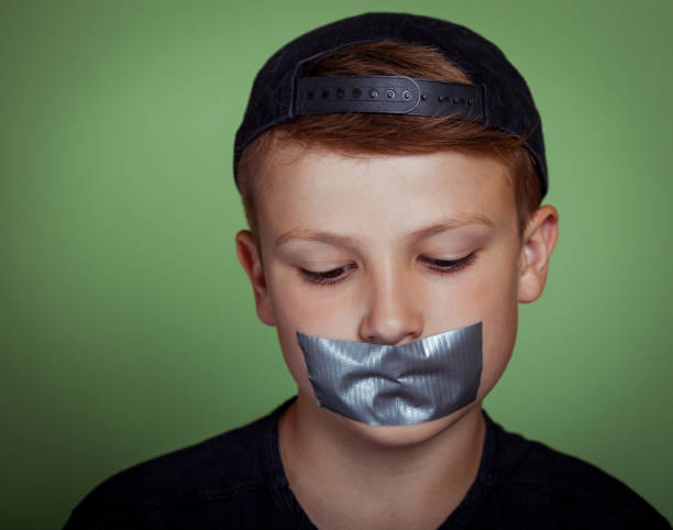 Råd Rund skæg Speechless Boy With Duct Tape Over Mouth Stock Photo - Download Image Now -  Mouth, Covering, Child - iStock
