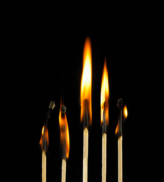 istock ROW OF FIVE MATCHES BURNING 963541038