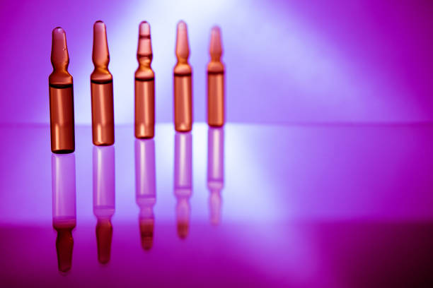 istock Ampoules with cosmetical tools, collagen or vitamins 963542152