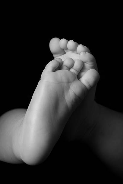 istock Pair of Baby Feet 96355781