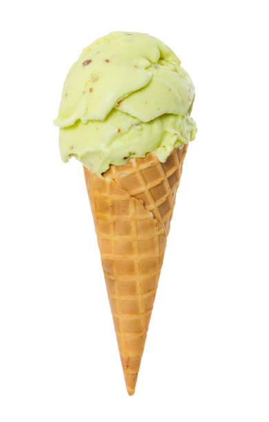 istock Pistachio ice cream in waffle cone isolated on white 963559696