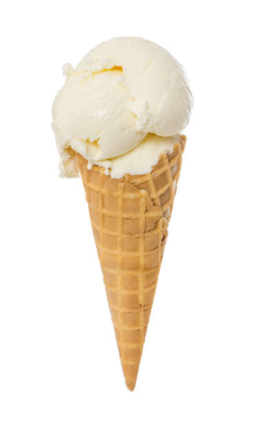 istock Vanilla ice cream in waffle cone isolated on white 963559710
