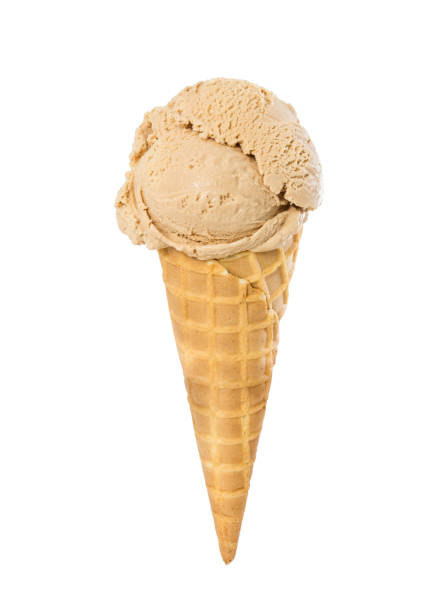 istock Ice cream creme brulee in waffle cone isolated on white 963559746