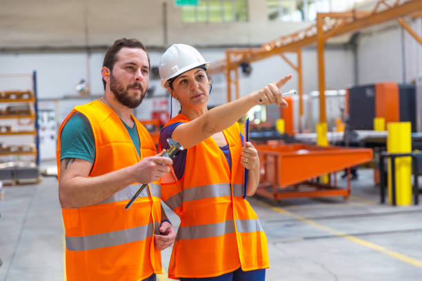 istock Supervisor and Worker in Steel Factory 963562416