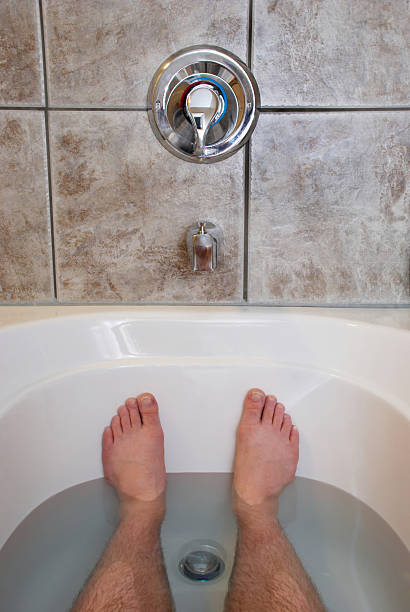 istock Feet Relaxing in Bathtub 96356326