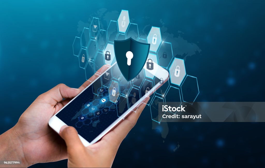 Unlocked smartphone lock Internet phone hand Business people press the phone to communicate in the Internet. Cyber security concept hand protection network with lock icon and virtual screens Space put message Blue tone Security Stock Photo