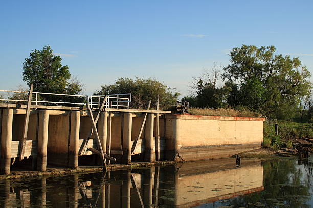 istock old pier at a dam and flood gate support beams 96360193