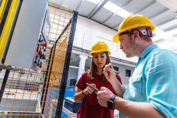 istock Supervisor and Worker in Steel Factory 963602950