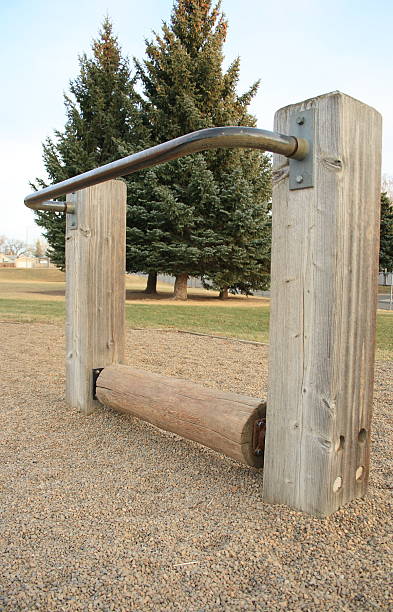 istock wooden playground equipment log roller 96360386